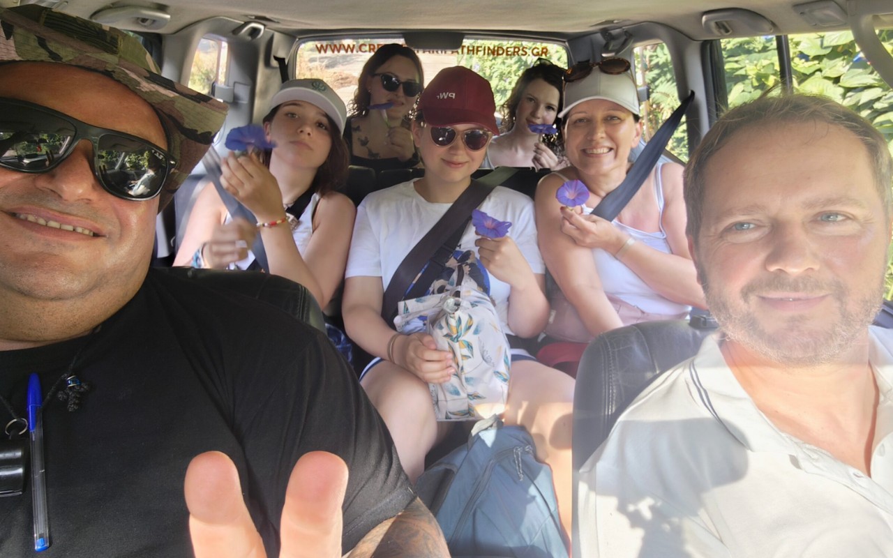 People in car off road